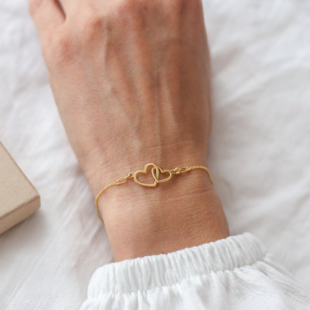 Til min Datter - armbånd i gull med sammenkoblede hjerter